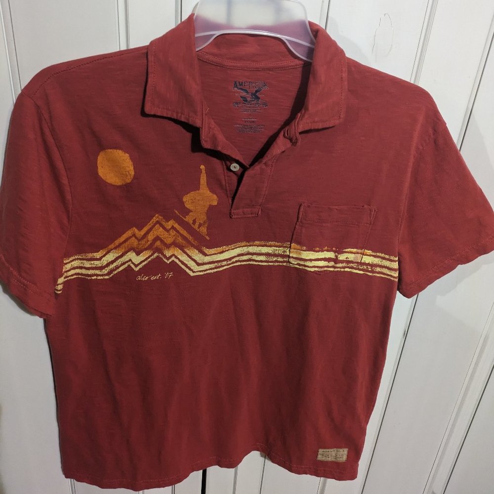 Boy's Red polo shirt.